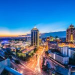 loans against property in Gauteng, Sandton City skyline at sunset